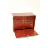 One coin display cabinet with draws. Well constructed in wood
