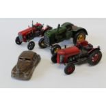 Three scale model tractors, to include a 1931 John Deere in green livery, a Massey Ferguson 35X and
