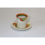 A 1930's Clarice Cliff Bizarre Nemesia coffee can and saucer, number 8876. Painted and printed