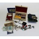 A collection of bijouterie, coins and bank notes. To include costume jewellery, Soviet pin badges, a