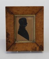 19th century English School, a silhouette portrait miniature of a gentleman in formal attire. Cut