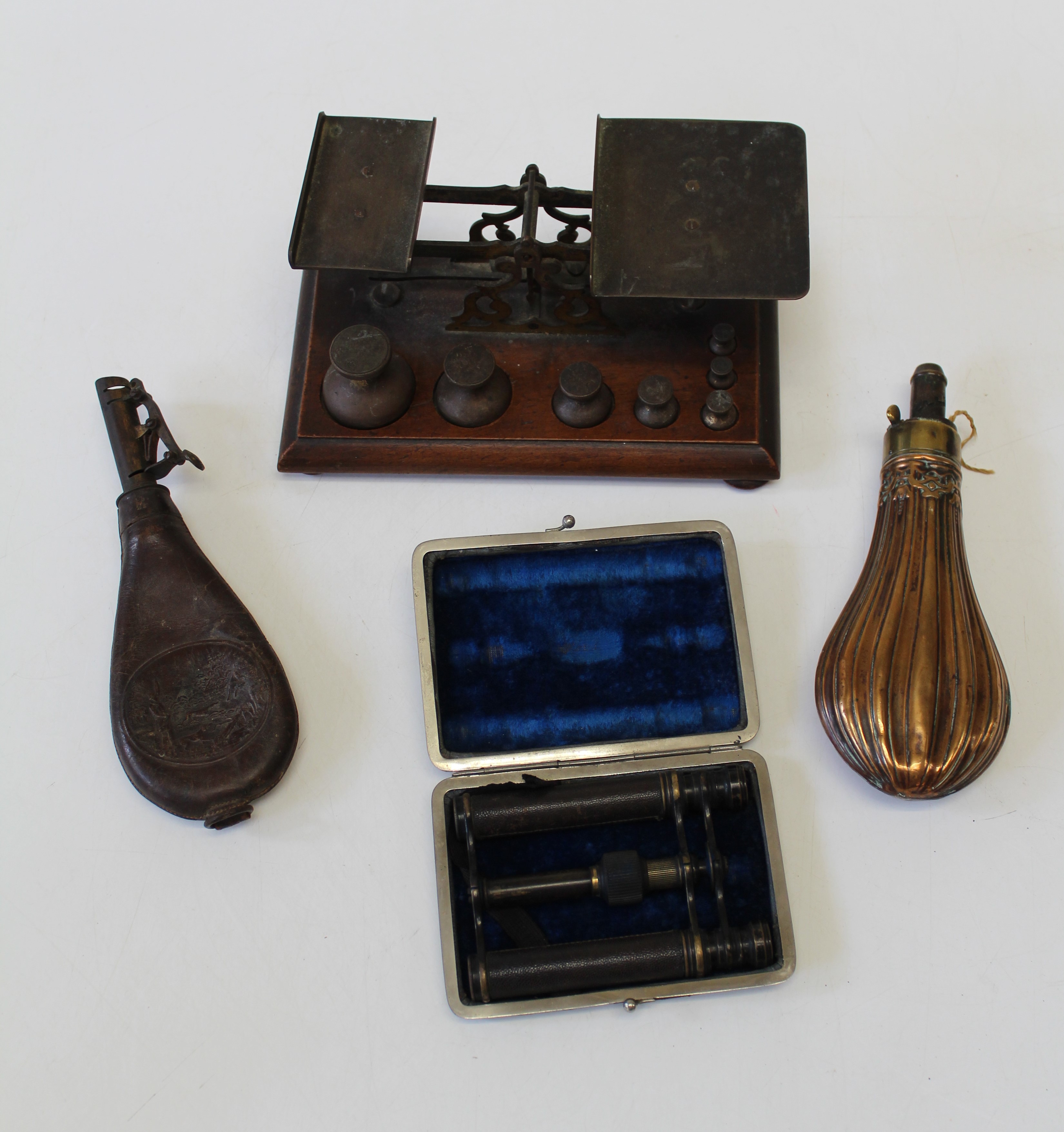 A collection of miscellaneous items, to include a 19th century copper powder flask, the body with