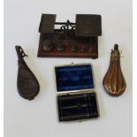 A collection of miscellaneous items, to include a 19th century copper powder flask, the body with