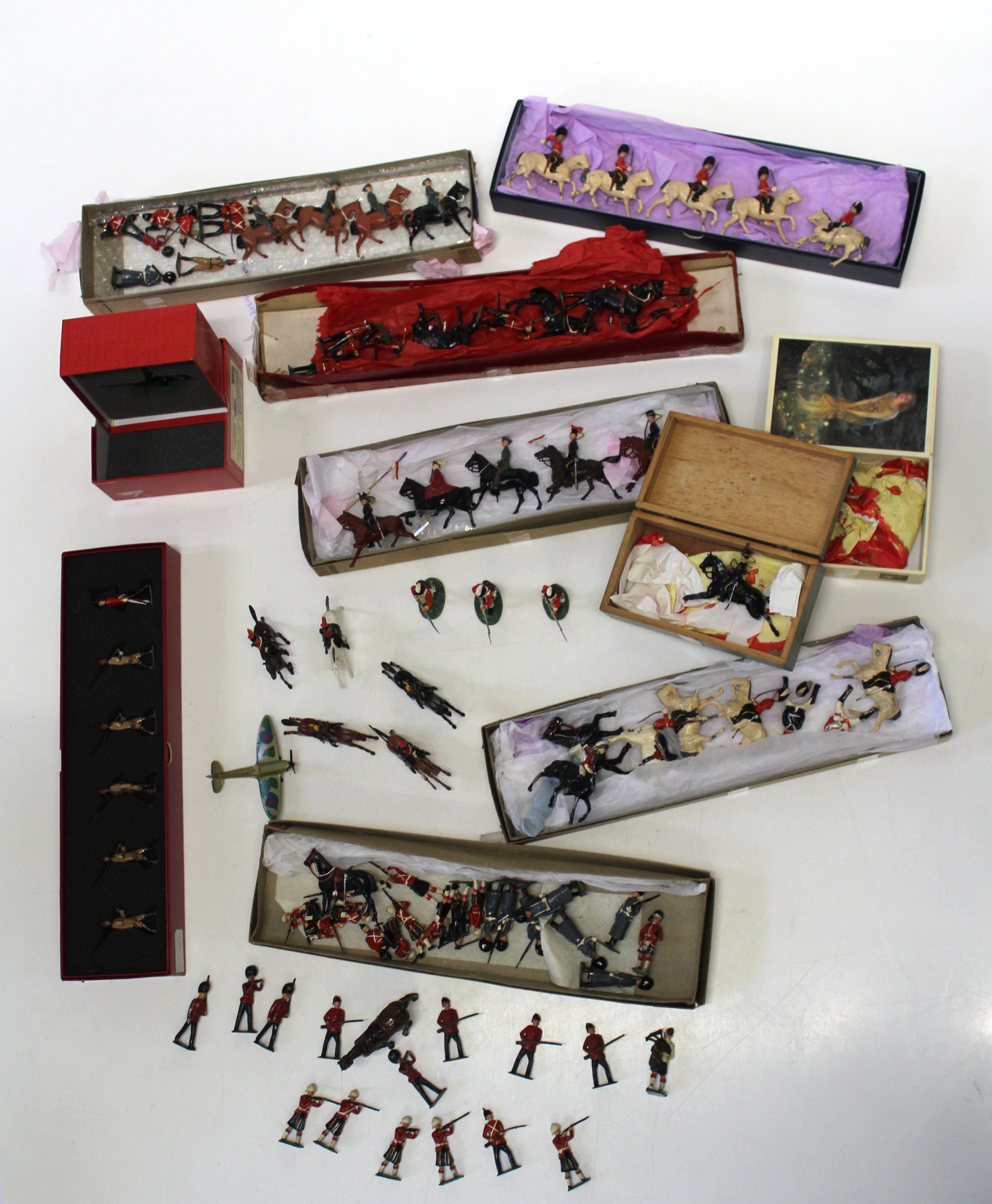 A collection of pre-war and later Britains lead soldiers, various mixed boxes including Dragoons,