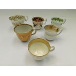 Six 18th century English porcelain tea and coffee cups. Various factories and patterns Circa 18th