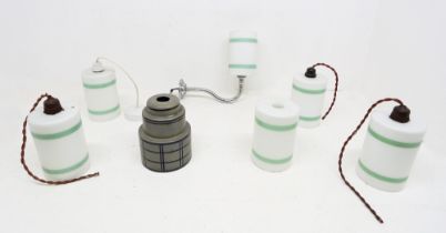 A collection of 20th century Art Deco style glass light shades to include; five matching cylindrical