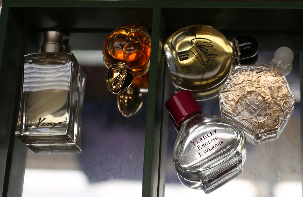 A collection of thirty-four miniature and sample perfume bottles, comprising vintage and later - Image 3 of 7