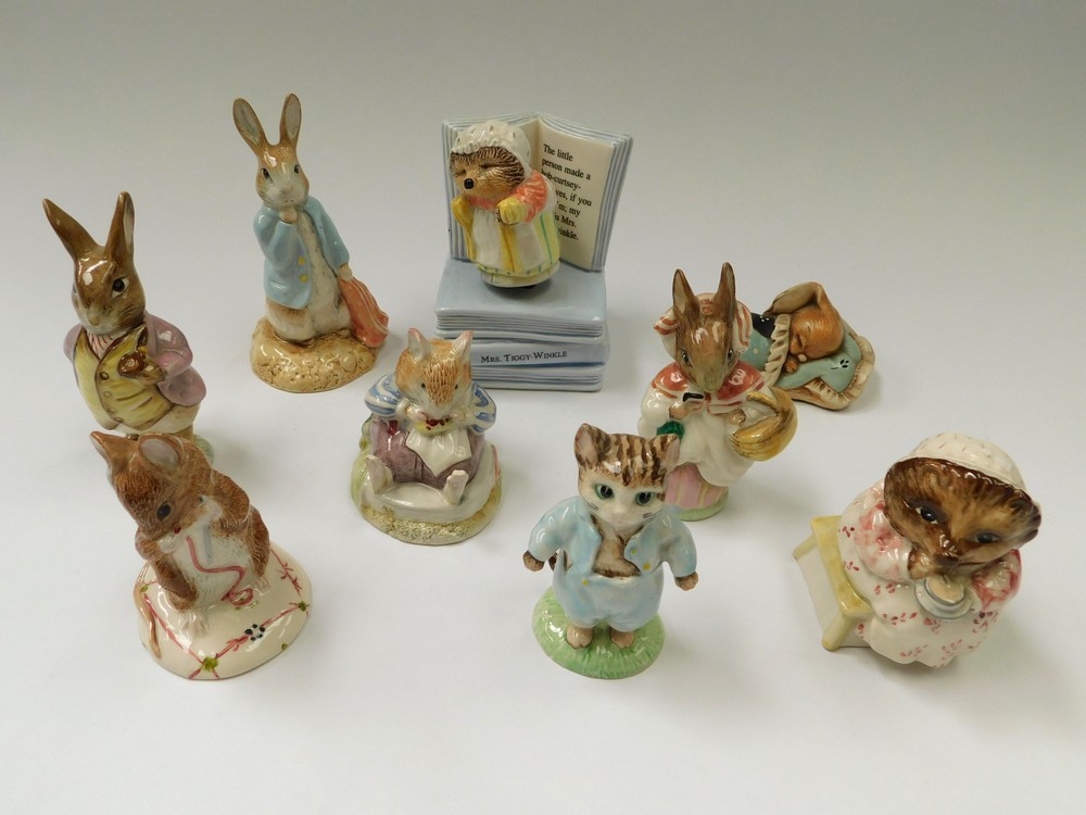 A collection of Royal Albert Beatrix Potter figures, including musical Mrs Tiggy Winkle in working