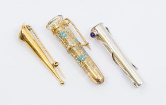 Boutonnieres: three stylish silver buttonhole posy holders, one in silver gilt, shaped as a