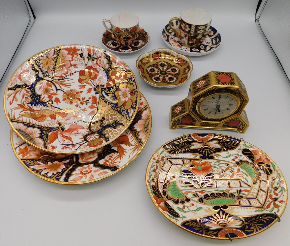 A boxed Royal Crown Derby Imari 1128 clock, together with other Derby items, including cup and