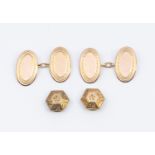 A pair of 9ct rose gold oval cufflinks with engine turned surround, weight approx 5.3gms along