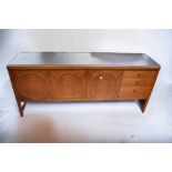 An early 1970s Nathan 'Circles' sideboard with three cupboard doors and three drawers along with a