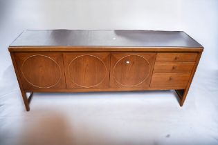 An early 1970s Nathan 'Circles' sideboard with three cupboard doors and three drawers along with a