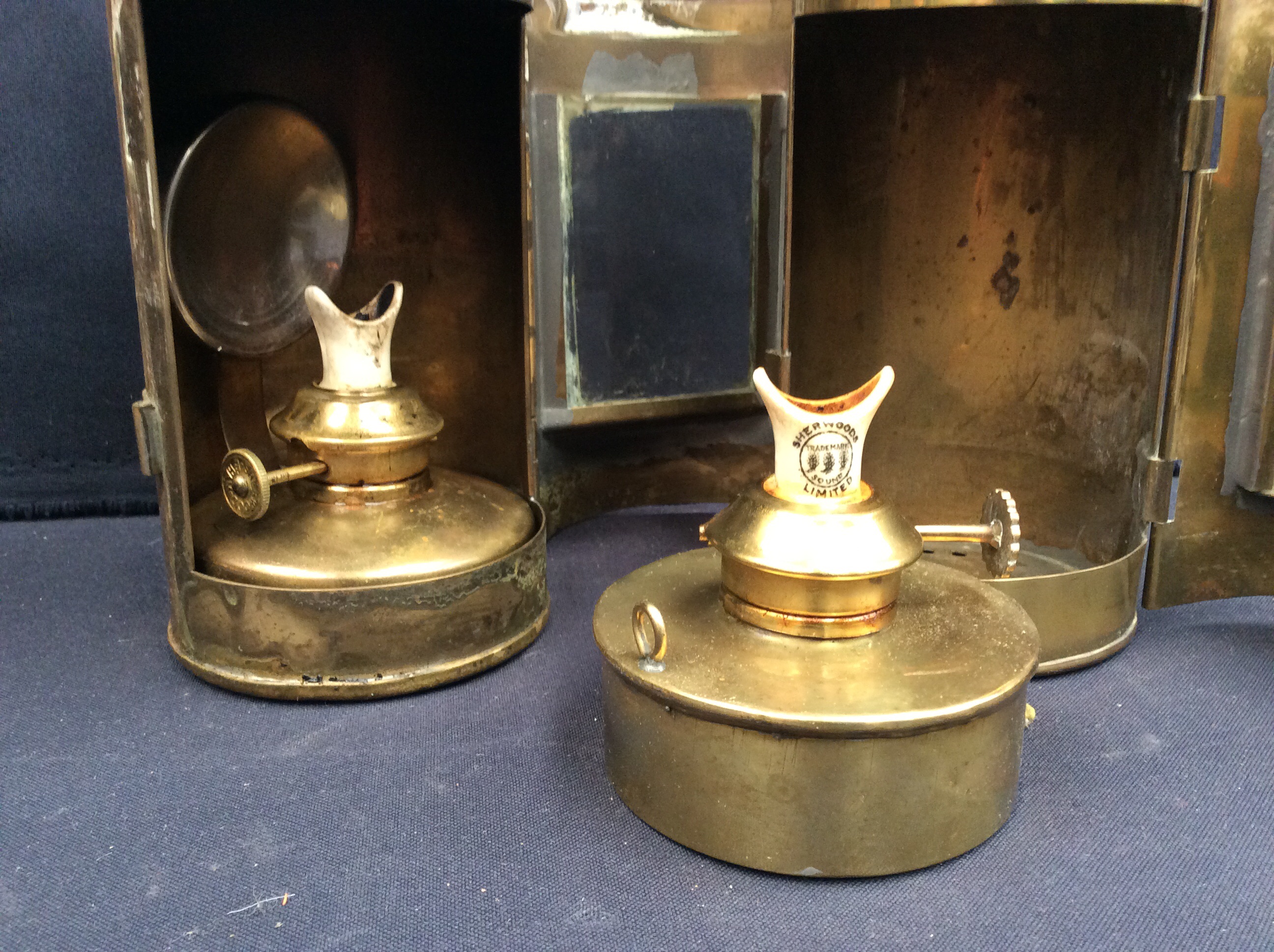 Two brass hand held oil lamps along with an International gas detector lamp. - Image 2 of 5