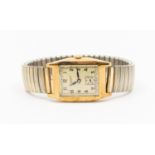 A J.W Benson 9ct gold cased gents 1930's wristwatch, comprising a rectangular champagne dial with