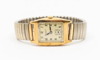 A J.W Benson 9ct gold cased gents 1930's wristwatch, comprising a rectangular champagne dial with