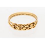 An 18ct gold knot ring, width approx 4mm, size N, weight approx 2.6gms Further details: wear to