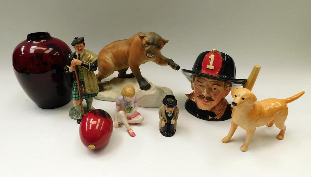 Royal Doulton and Beswick: a mixed collection to include: Mountain Lion, dogs, flambe, figurines,