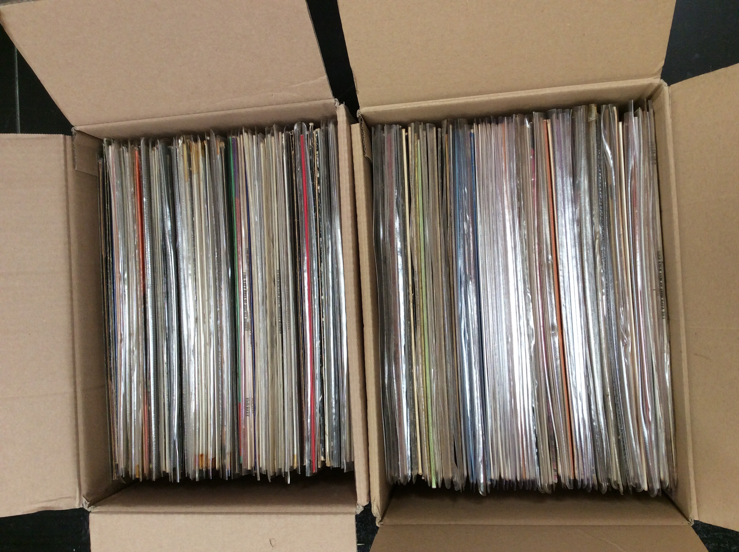 Two boxes of LPs to include Nat King Cole and Shirley Bassey.