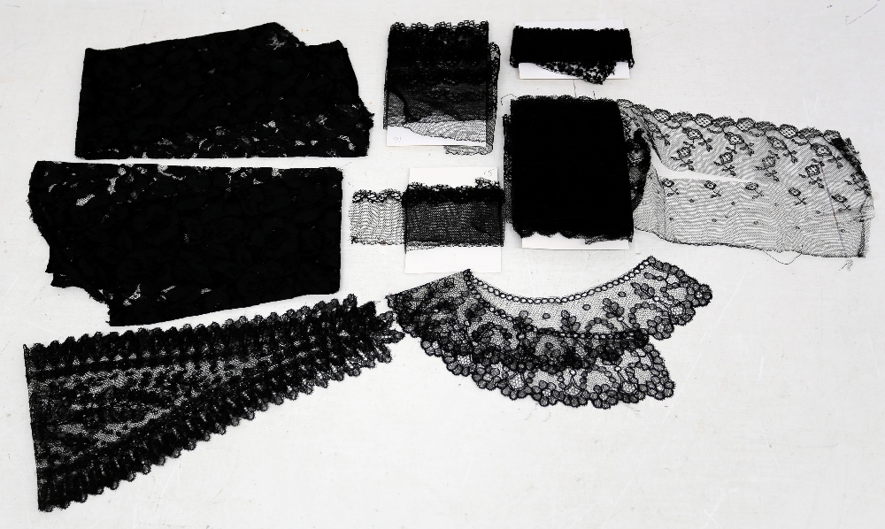 A collection of black lace, some chantilly to include a pair of sleeves, could be late Edwardian,