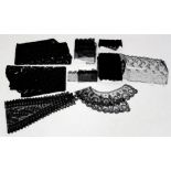 A collection of black lace, some chantilly to include a pair of sleeves, could be late Edwardian,