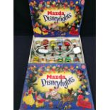 A boxed set of vintage Mazda Disney lights.