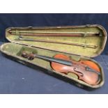 A 19th Century violin in case with Tyroleon lion scroll, with two bows, one named Roth Glasser.