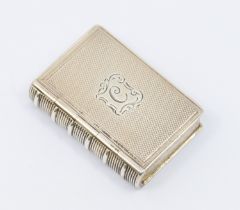 A Victorian silver book shaped vinaigrette, the cover with engraved initial, opening to reveal