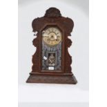 A 19th Century American cookie 8 day mantle clock.