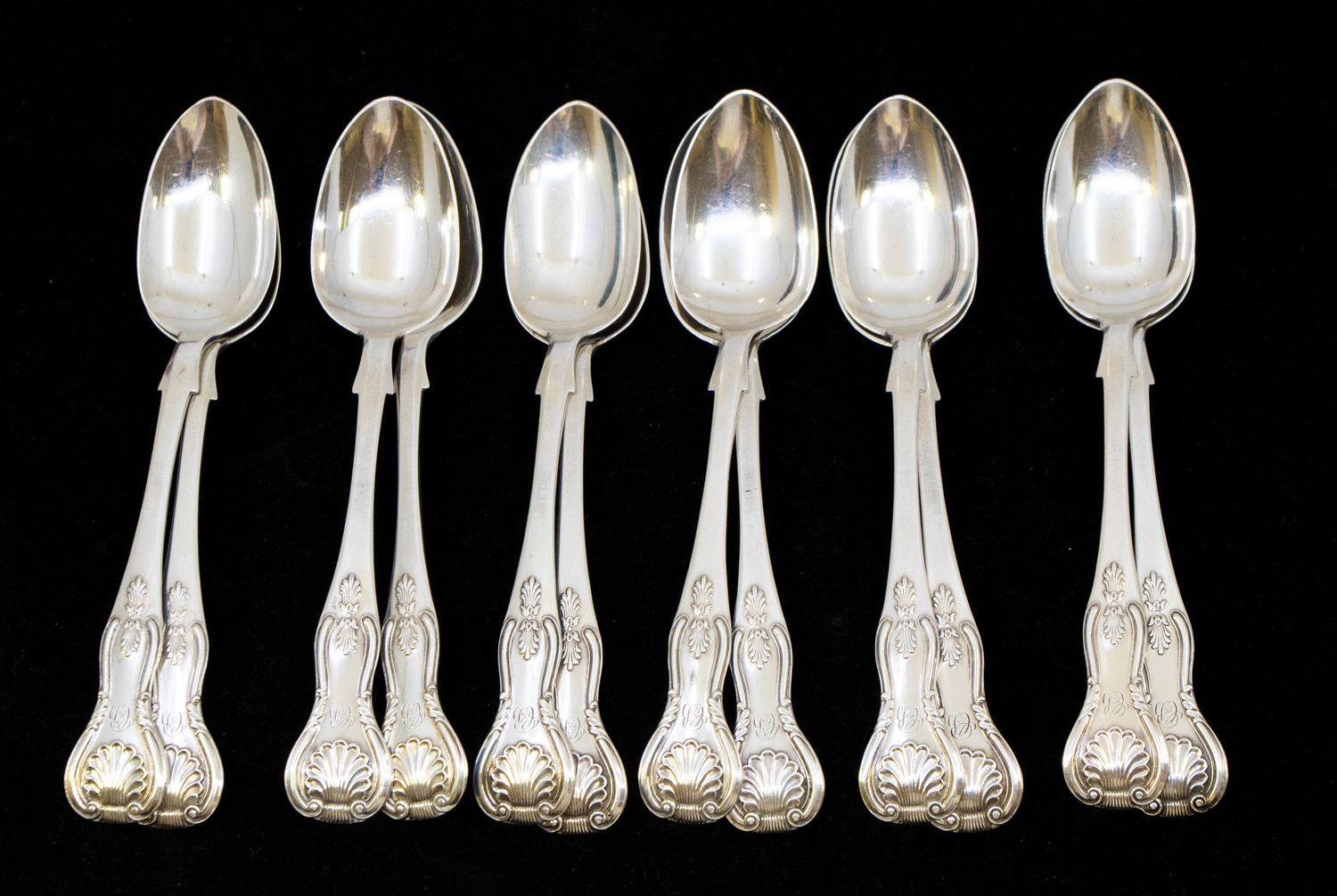 A set of twelve Victorian Scottish silver Queens pattern teaspoons, all initialled to terminals,