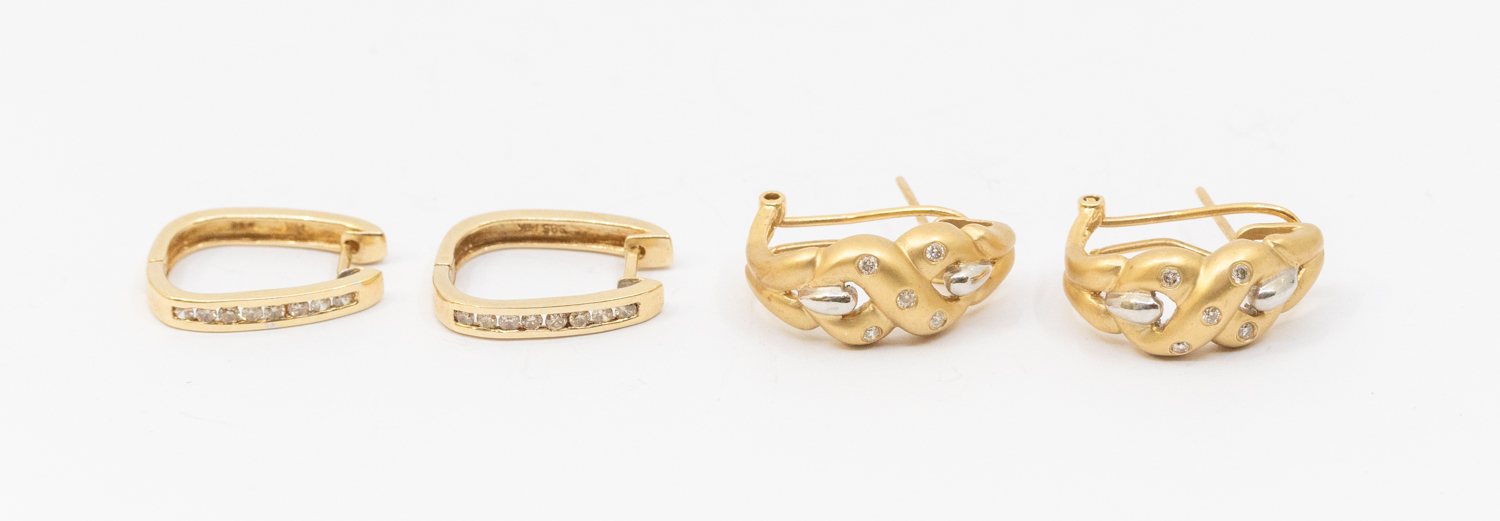 A pair of diamond set 18ct gold earrings, comprising a brushed gold cross flush set with small
