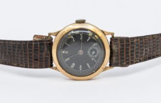 A 9ct gold 1940's Junior wristwatch, comprising a black dial with Arabic markers, subsidiary dial at