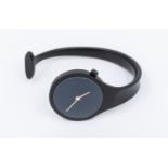 Georg Jensen- a ladies Vivianna black bangle wristwatch, comprising a black dial with gilt hands,