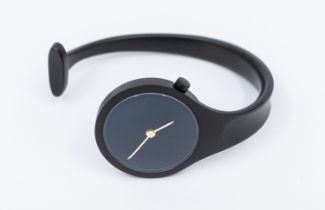 Georg Jensen- a ladies Vivianna black bangle wristwatch, comprising a black dial with gilt hands,