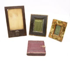 Three early 20th Century photo frames, one with military interest along with travel photo frame with