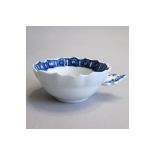 A small, rare Derby blue and white wine taster/tastevin with ogee shaped bowl and lobed rim, painted