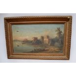 Italian school 19th Century oil on canvas of Ruins next to lake within period gilt frame,