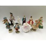 A collection of porcelain English and Continental figures including mid 20th century Doulton