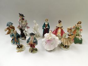 A collection of porcelain English and Continental figures including mid 20th century Doulton
