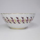 A Worcester Flight Period Fluted Bowl. Decorated with Puce Berries and leaves in a Gilt Swag Border.