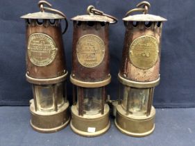 Three Eccles of Manchester miners lamps, type SL.