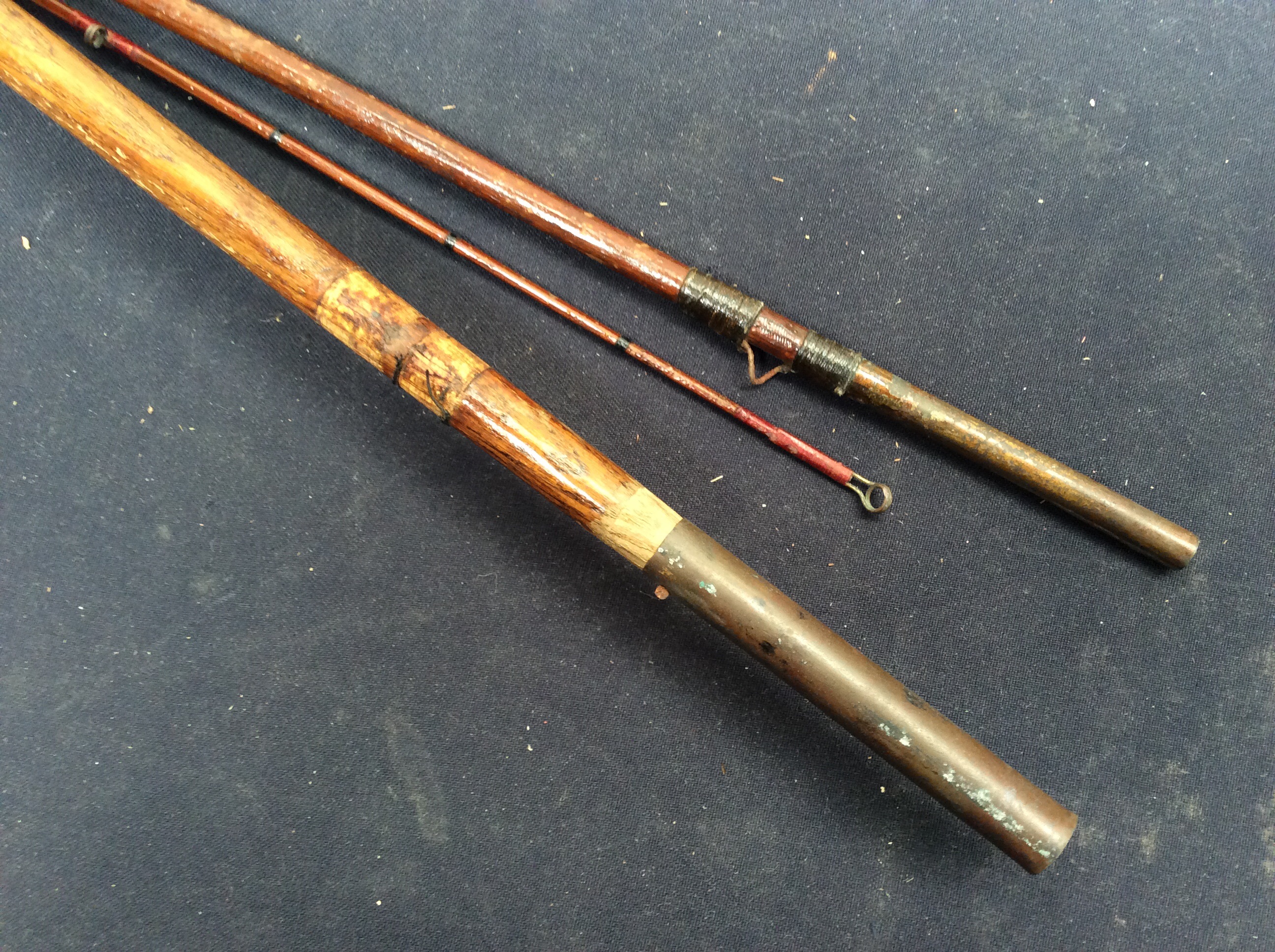 Three early 20th Century fishing reels with nets along with an early 20th Century cane fishing rod. - Image 3 of 3