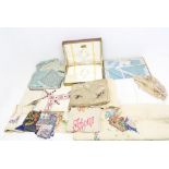 A collection of linen and table wear to include a set of dorma embroidered pillow cases in