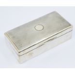 A George V rectangular silver cigarette box, engine turned decoration to cover, cedarwood interior