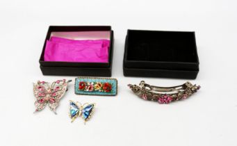 A collection of costume jewellery to include a silver engraved hollow hinged bangle, silver cased