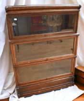 The Globe Wernick Co Ltd of London early 20th Century oak three glazed bookcase with label, in great