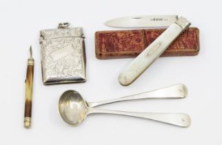 A small collection of silver items to include; an Edwardian silver vesta case, engraved design,