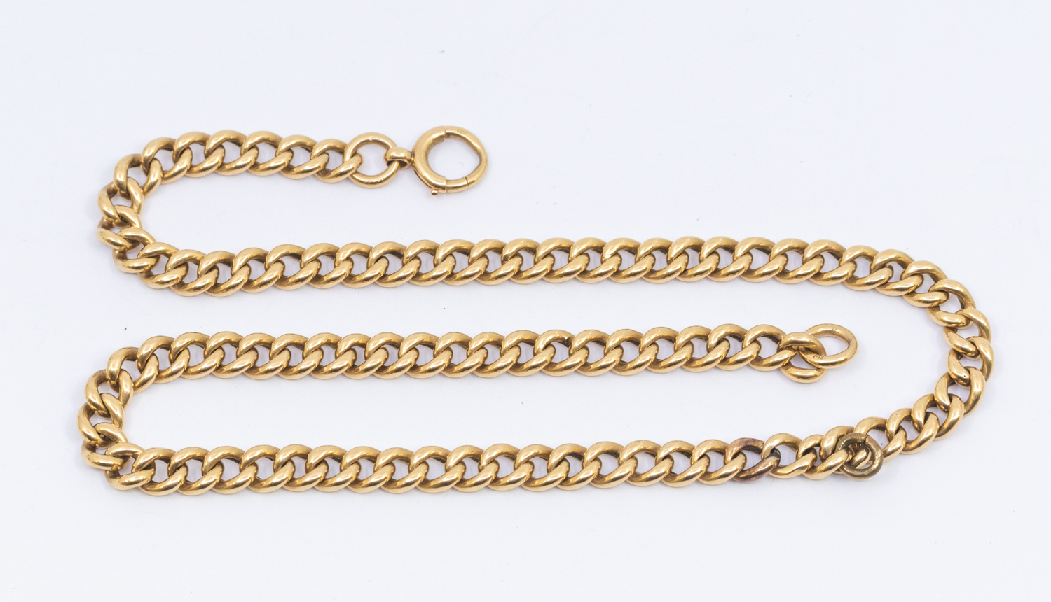 An 18ct gold curb link chain, width approx 6mm, bolt clasp, length approx 44cm, weight approx