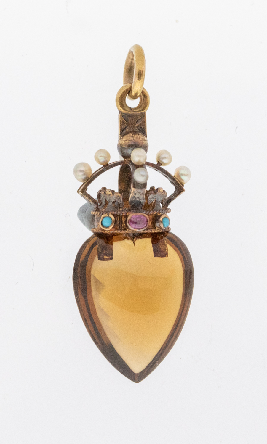 A late Victorian citrine and gold heart and crown pendant, comprising a heart shaped citrine with