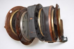A collection of late 19th Century/early 20th Century round wall clocks, spares and repairs.